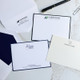Your Logo Printed on Flat Cards - 4.5” x 6.25” - White & Ivory Paper shown - StationeryXpress.com
(Card on top is full-color flat ink with black border on white paper, bottom left is navy raised ink with navy border on white paper, bottom-right is slate gray raised ink on ivory paper with no border) Your Logo Printed on Flat Cards - 4.5” x 6.25” - White & Ivory Paper shown - StationeryXpress.com
(Card on top is full-color flat ink with black border on white paper, bottom left is navy raised ink with navy border on white paper, bottom-right is slate gray raised ink on ivory paper with no border)