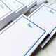 8 Custom Santa Monica Notepads & 8 Names - Extreme Close Up - EG7092 - StationeryXpress.com. Shown with font L34, Navy Ink.