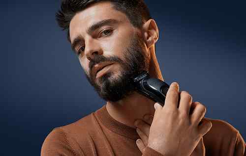 Trimming and shaping a Balbo beard using a trimmer for precise definition