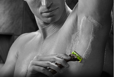 Man shaves armpit with GilletteLabs body razor
