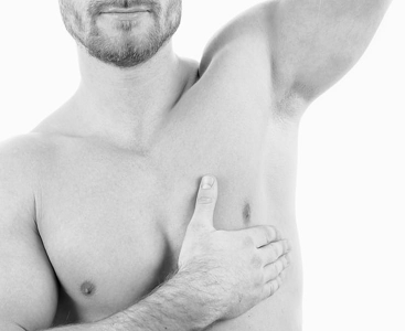 Man demonstrates how to shave your armpits