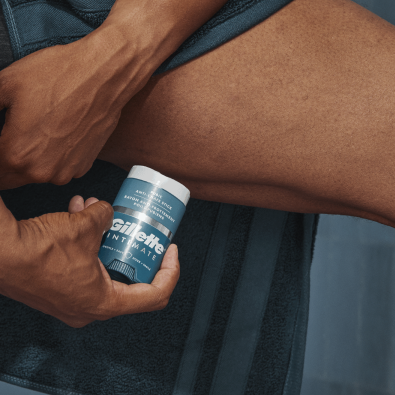 Applying Gillette anti‑chafing stick to help soothe skin after complete hair removal