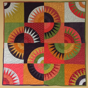 Liberty Crown in black, white, orange and green