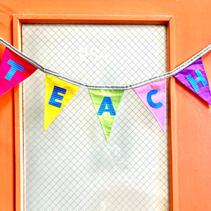 Teacher banner using raw edge appliqué letters