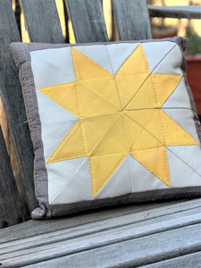 Pillow with the North Star quilt block