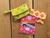 Showing 3 finished money bags wallet patterns with one open