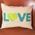 Decor pillow with heart used as the 'O' in LOVE