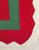 Detail of the corner for broadway border in red and green