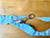 Showing trimming the excess fabric for the wave border
