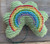 Rainbow stuffie made with the blossom in the Quiltsmart methods pack