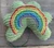 Rainbow stuffie made with the blossom in the Quiltsmart sample project pack