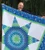 Blue and green lone star quilt
