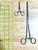 Two sizes of hemostats