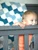 Baby with a blue bow tie quilt
