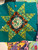 North star quilt block in greens
