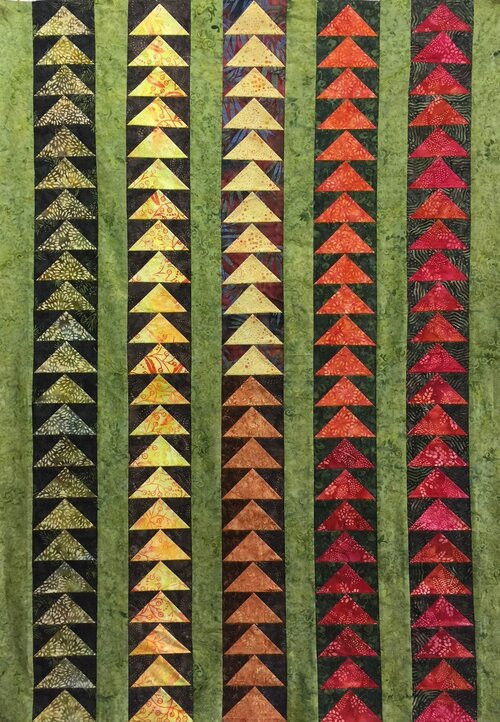 Fall colored flying geese quilt