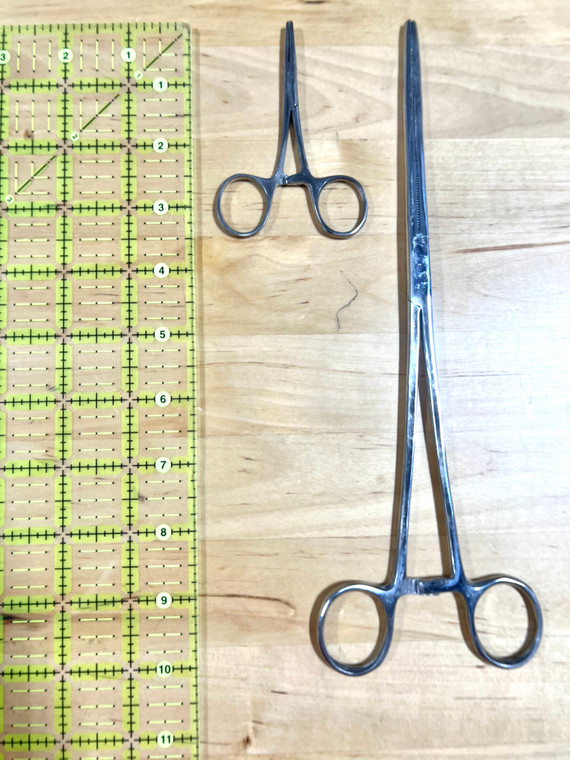 Two sizes of hemostats