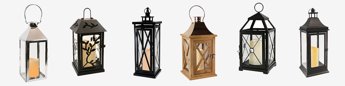 Black metal lanterns, silver lanterns, and wood lanterns with candles.