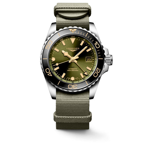 Longines HydroConquest [L3.790.4.06.2], wristwatch with green dial and stainless steel case, beige strap, and rotating bezel.
