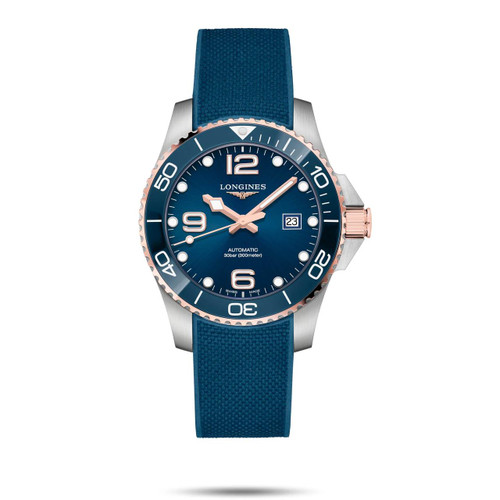 Longines HydroConquest watch, blue dial with luminous hands and markers, stainless steel case with rose gold bezel, blue rubber strap, and date display on the right side.