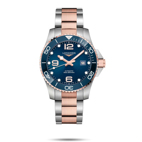 Longines HydroConquest [L3.782.3.98.7], luxury men's diver watch featuring a blue dial, rose gold and stainless steel bracelet, water resistance up to 300 meters, and automatic movement.