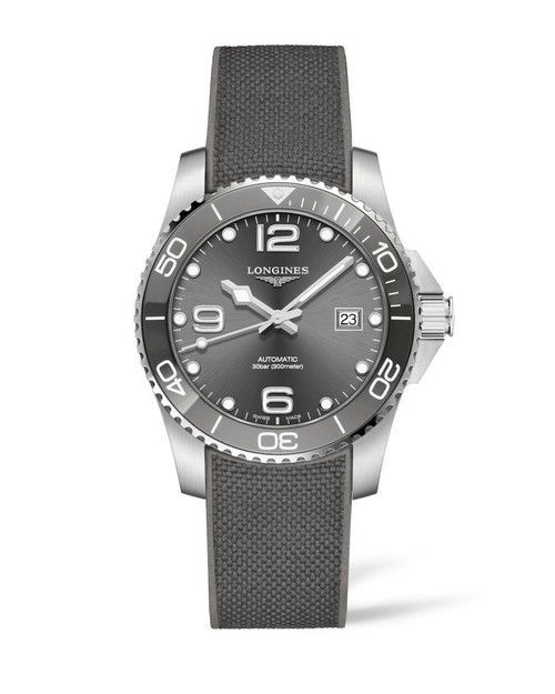 Longines HydroConquest, men's luxury diving watch with grey dial, stainless steel case, and black fabric strap.