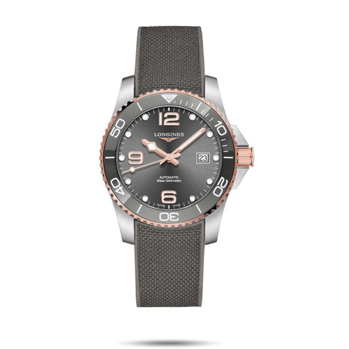Longines HydroConquest, luxury wristwatch with a dark grey dial, rose gold bezel and accents, and a grey textured strap.