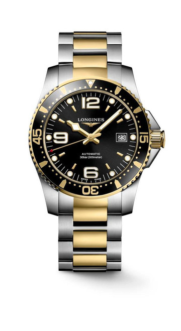 Longines HydroConquest watch, luxury dive watch with black dial, gold and silver stainless steel bracelet, rotating bezel, date display, and water resistance up to 300 meters.