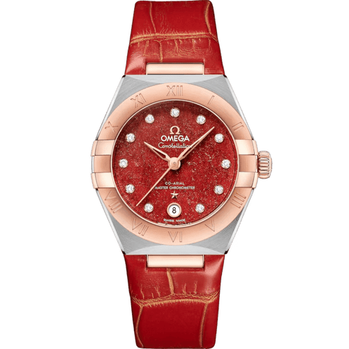 OMEGA Constellation co-axial Master Chronometer 29 mm, close-up of a luxury wristwatch with a red dial featuring diamond hour markers, a red leather strap, and rose gold and stainless steel case.