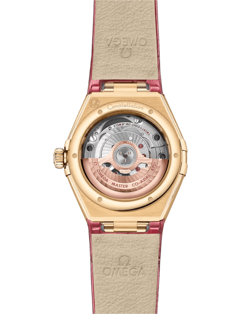OMEGA Constellation co-axial Master Chronometer 29 mm, watch back showing intricate mechanical movement and gold case with pink leather strap.