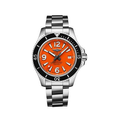 BREITLING Superocean Automatic 42, stainless steel watch with a vibrant orange dial, black and silver bezel, and metal bracelet band.