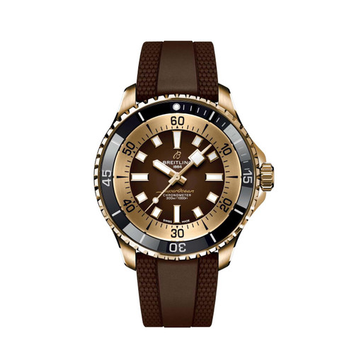 Breitling Superocean Automatic 44 watch, brown dial with gold-tone bezel and strap, featuring luminous hands and markers, and a date complication at 3 o'clock.