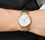 LONGINES LA GRANDE CLASSIQUE DE LONGINES [L4.755.2.11.7] watch, elegant wristwatch with gold and silver band and white dial with Roman numeral hour markers.