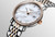 LONGINES THE LONGINES ELEGANT COLLECTION [L4.310.5.88.7], luxury women's wristwatch with a mother-of-pearl dial, diamond-studded bezel, and two-tone stainless steel and rose gold bracelet.