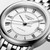 Longines Flagship Automatic Watch, silver dial with Roman numerals, date window at 4 o'clock, and stainless steel bracelet.
