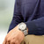 Longines Spirit watch, elegant silver dial with Arabic numerals and stainless steel bracelet on a man's wrist.