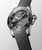 Longines HydroConquest [L3.781.4.76.9] watch, a close-up of a luxury diver's watch with a black dial, silver bezel, and a black rubber strap.
