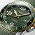 LONGINES HYDROCONQUEST [L3.781.3.06.9], close-up of a green dial diver's watch with gold accents and a unidirectional rotating bezel.