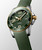 Longines HydroConquest, green dial diving watch with gold accents, stainless steel case, and green rubber strap.