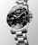 Longines HydroConquest, stainless steel diver's watch with black dial, luminous hands and markers, date window at 3 o'clock, and rotating bezel.
