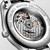 Longines The Longines Master Collection watch, showcasing the detailed Swiss-made automatic movement through a transparent case back with engraved branding and serial number.