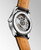 LONGINES THE LONGINES MASTER COLLECTION [L2.409.4.78.3] watch, detailed view of the watch's transparent case back showcasing its intricate mechanical movement with engraved details and brand name.