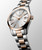 LONGINES CONQUEST CLASSIC [L2.386.3.72.7] watch, elegant two-tone silver and rose gold wristwatch with date display and a sleek design.
