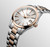 Longines Conquest Classic watch, two-tone stainless steel and rose gold bracelet with silver dial and date display.