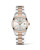 Longines Conquest Classic, elegant stainless steel and rose gold wristwatch with silver dial and date display.