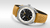 OMEGA Seamaster Olympic Official Timekeeper co-axial Master Chronometer 39.5 mm watch, featuring a black and white dial with yellow accents and a tan perforated leather strap.