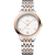Omega De Ville Prestige Co-Axial Master Chronometer 34 mm watch, elegant two-tone silver and rose gold bracelet with a white dial, Roman numeral hour markers, and date display at 6 o'clock.