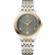OMEGA De VillePrestige Co-Axial Master Chronometer 34 mm watch, featuring a green dial with gold accents, two-tone stainless steel and gold bracelet, and a date display at the 6 o'clock position.