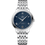 OMEGA De VillePrestige co-axial Master Chronometer 34 mm, silver stainless steel watch with a blue textured dial, Roman numeral and baton hour markers, and a date window at 6 o'clock.