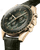 OMEGA Speedmaster Moonwatch Professional co-axial Master Chronometer Chronograph 42 mm, a luxurious wristwatch with a green dial, gold case, and black leather strap.
